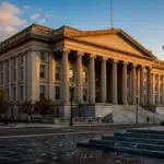 US Treasury Department building with digital blockchain elements representing cryptocurrency regulation