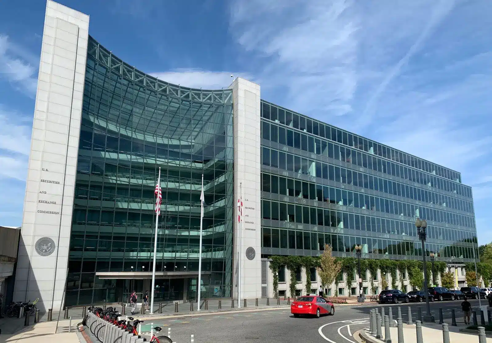 The curved glass exterior of the U.S. Securities and Exchange Commission headquarters building in Washington, D.C.